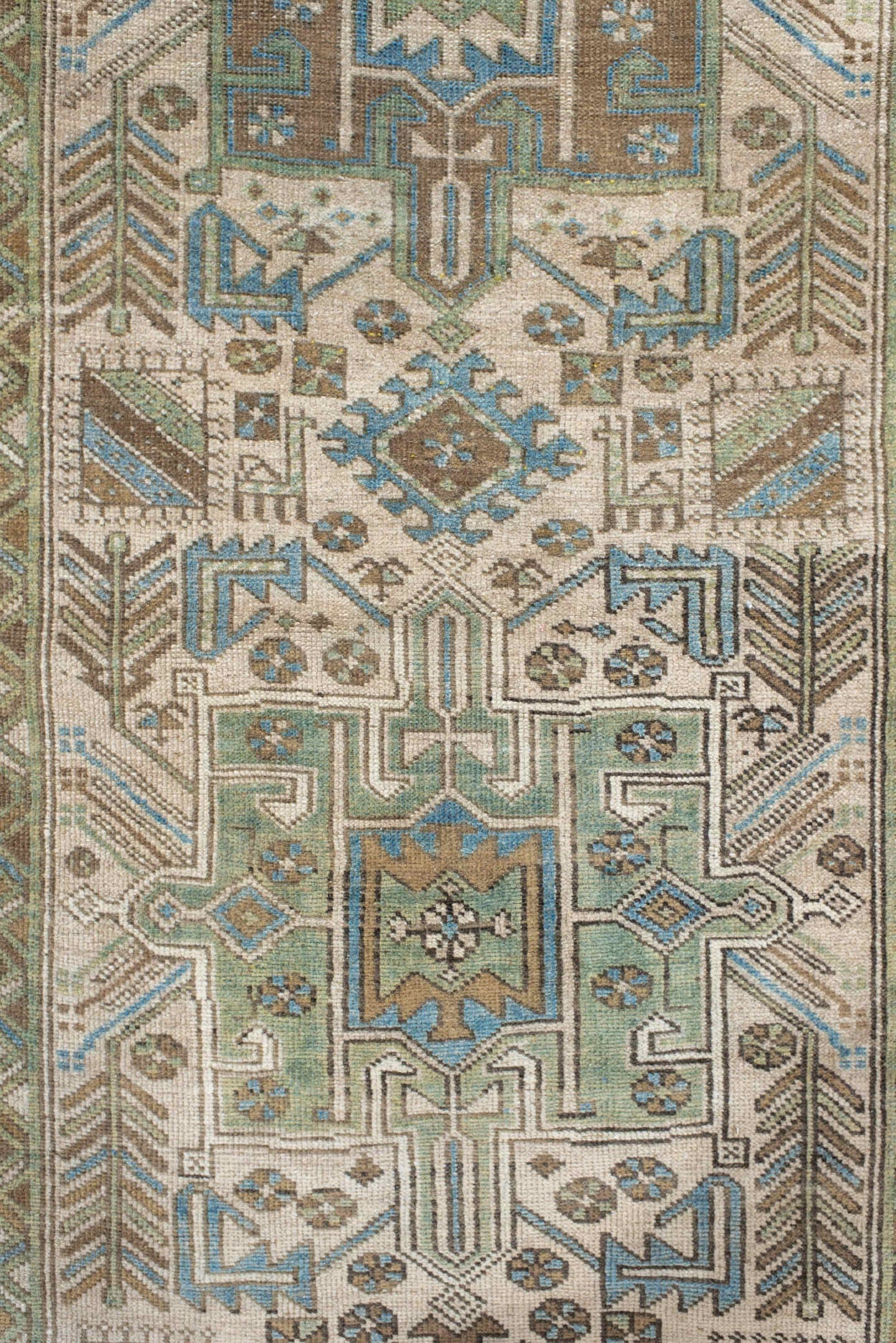 3' x 9' one-of-a-kind handmade vintage Heriz runner rug. Color palette: ivory, sky blue, taupe, brown, sage, charcoal