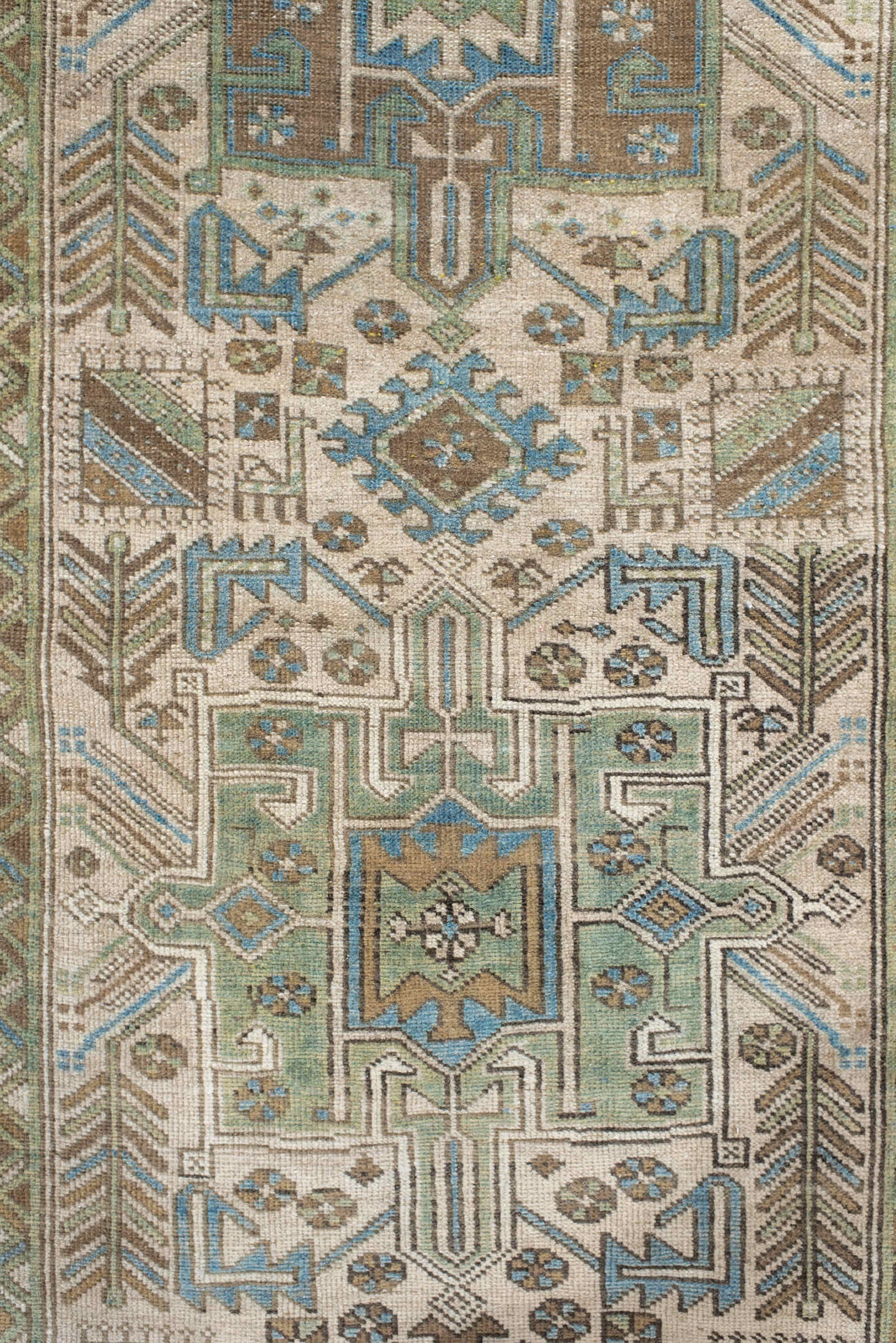 3' x 9' one-of-a-kind handmade vintage Heriz runner rug. Color palette: ivory, sky blue, taupe, brown, sage, charcoal