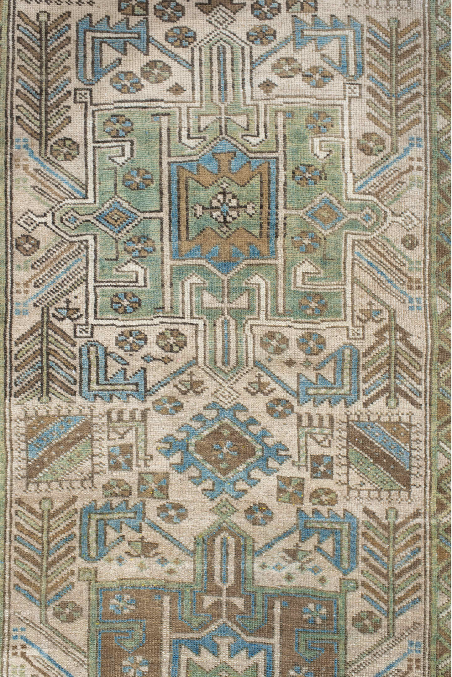 3' x 9' one-of-a-kind handmade vintage Heriz runner rug. Color palette: ivory, sky blue, taupe, brown, sage, charcoal
