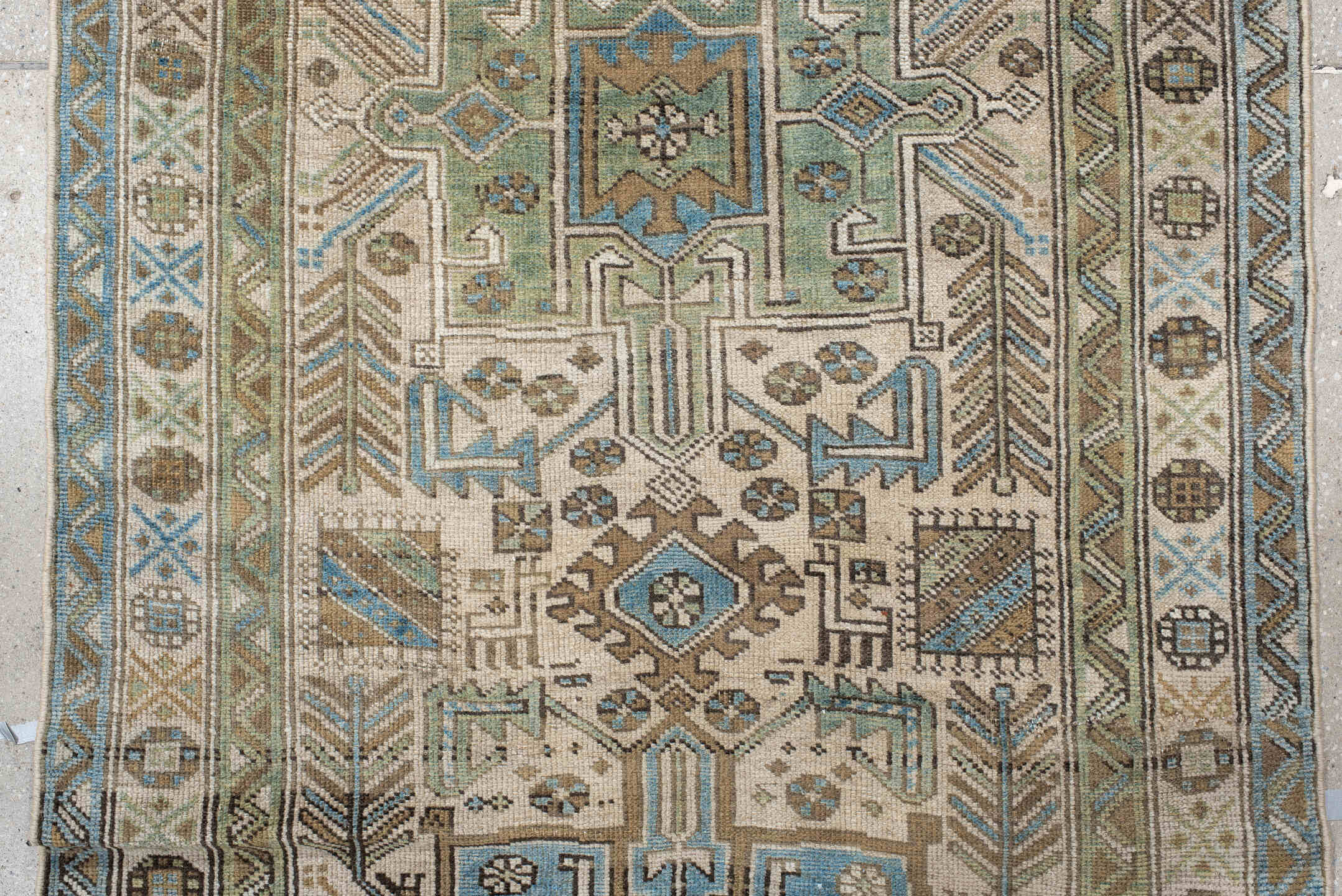 3' x 9' one-of-a-kind handmade vintage Heriz runner rug. Color palette: ivory, sky blue, taupe, brown, sage, charcoal