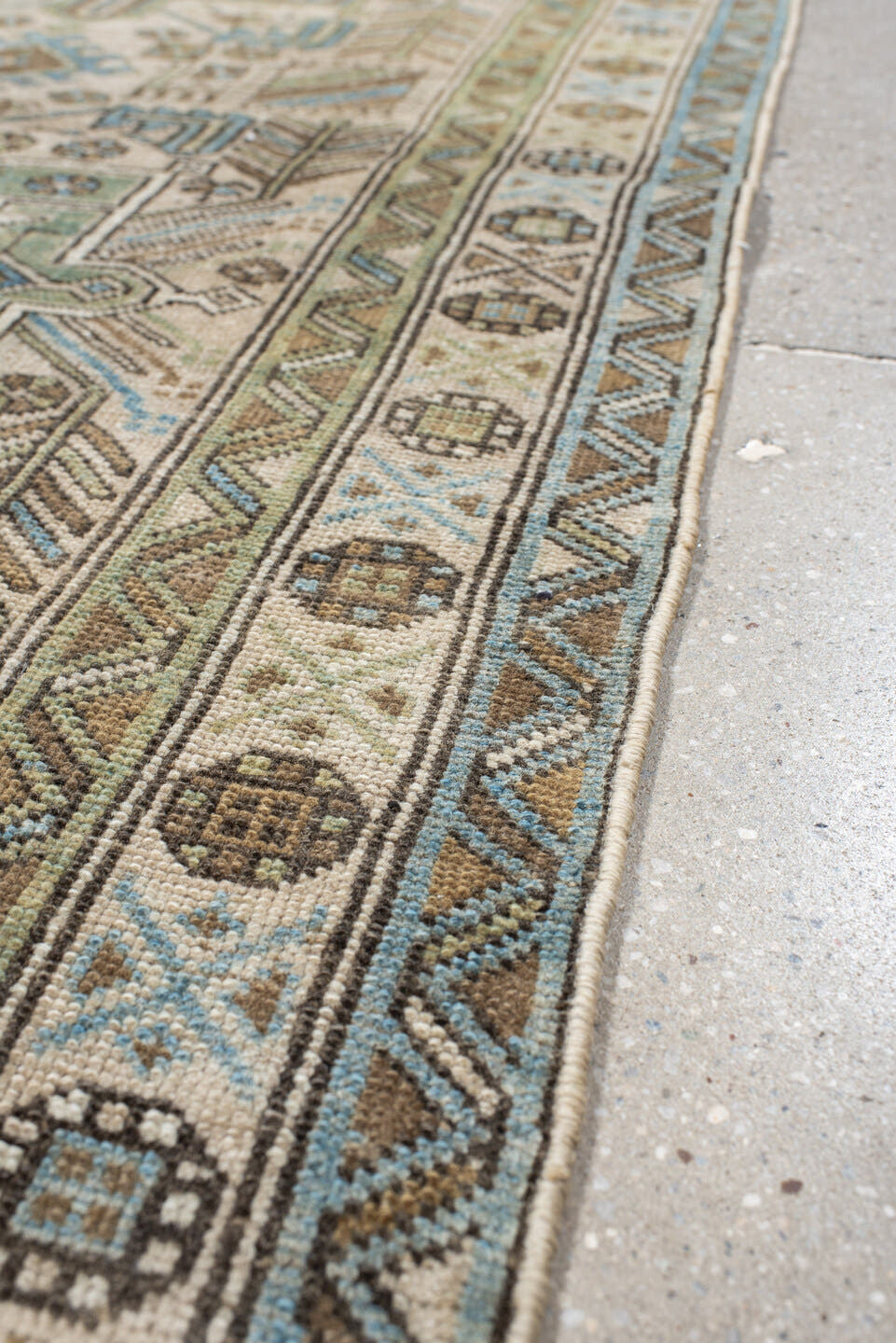 3' x 9' one-of-a-kind handmade vintage Heriz runner rug. Color palette: ivory, sky blue, taupe, brown, sage, charcoal