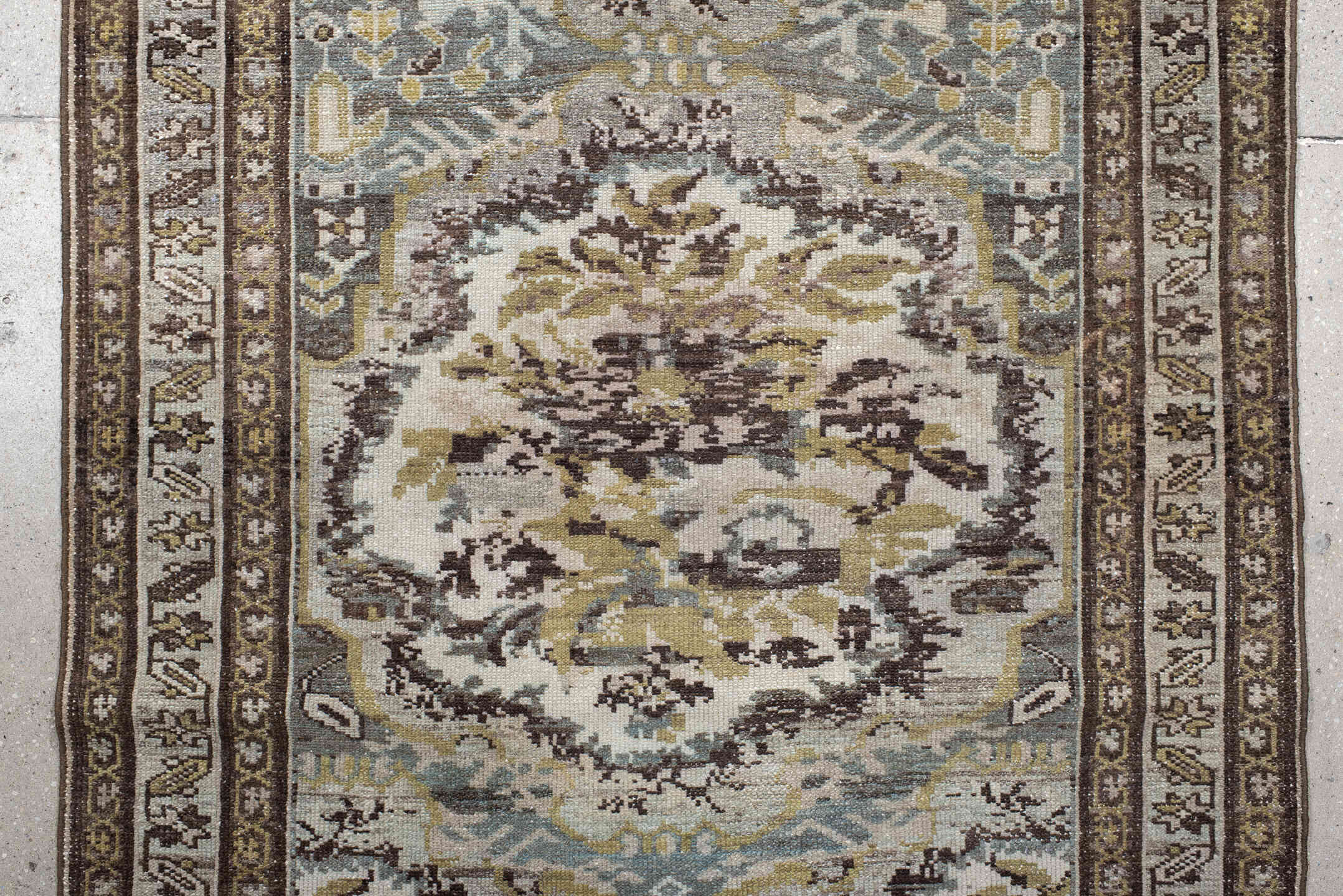 3' x 10' one-of-a-kind handmade vintage Baktiary runner rug. Color palette: ivory, brown, sage, taupe, gold, charcoal, green