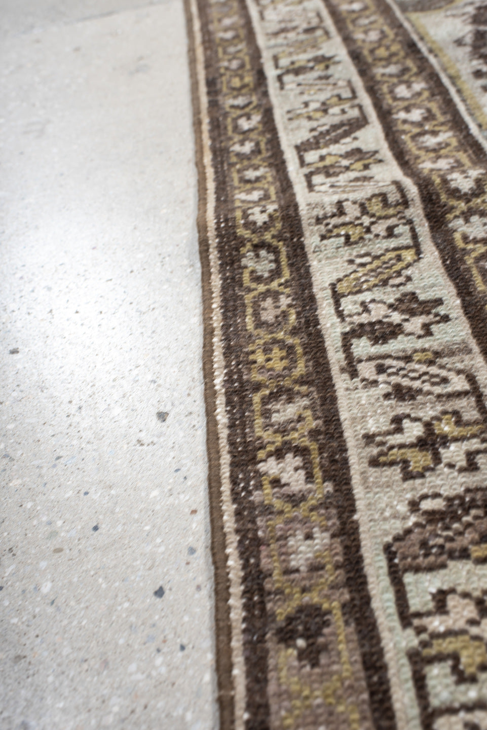 3' x 10' one-of-a-kind handmade vintage Baktiary runner rug. Color palette: ivory, brown, sage, taupe, gold, charcoal, green