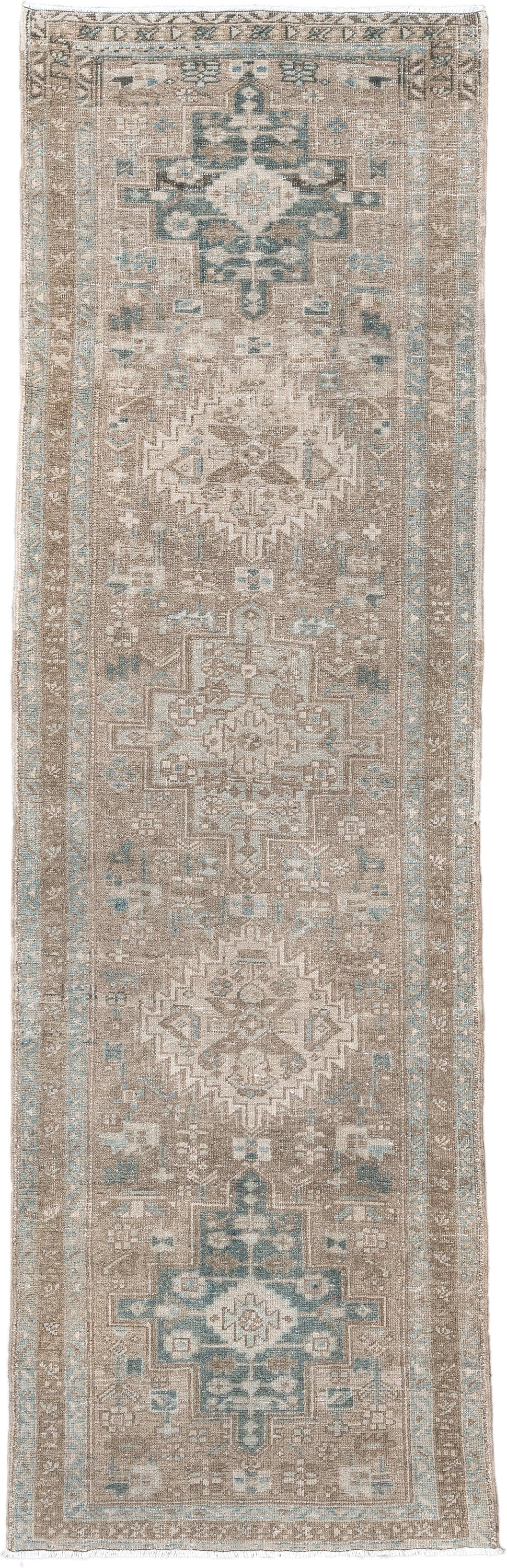 3' x 10' one-of-a-kind handmade vintage Heriz runner rug. Color palette: taupe, ivory, pale blue, beige, camel, sage, gray