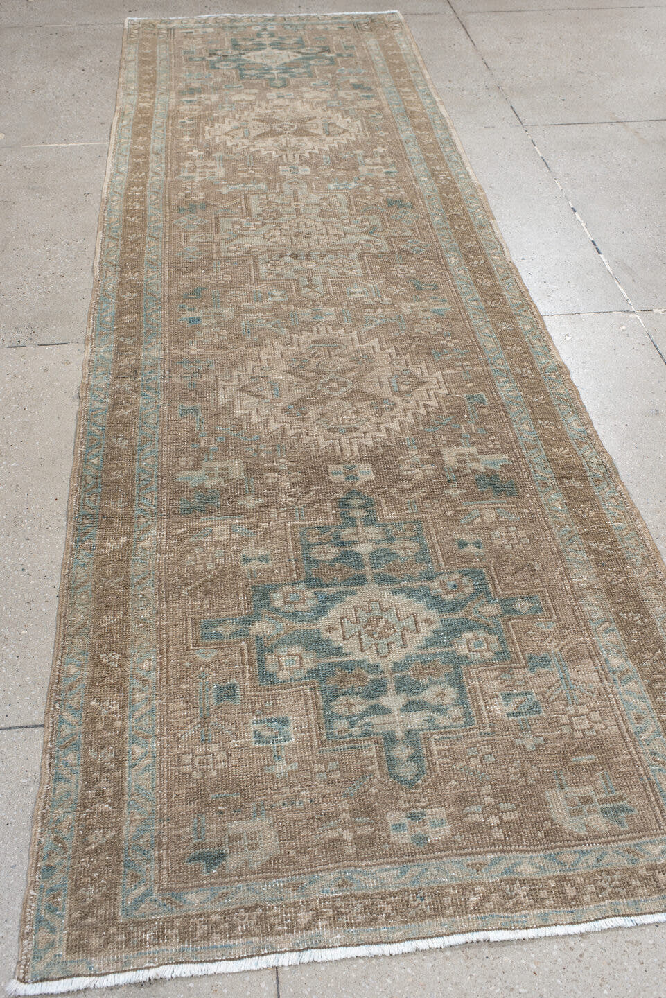 3' x 10' one-of-a-kind handmade vintage Heriz runner rug. Color palette: taupe, ivory, pale blue, beige, camel, sage, gray
