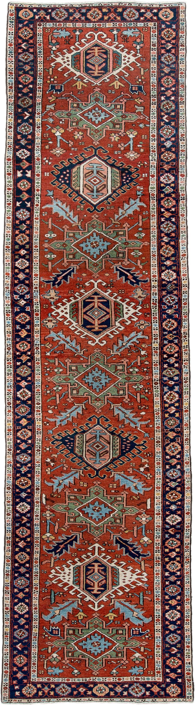 3' x 12' one-of-a-kind handmade antique Karaje runner rug. Color palette: rust, navy, ivory, sky_blue, sage, camel