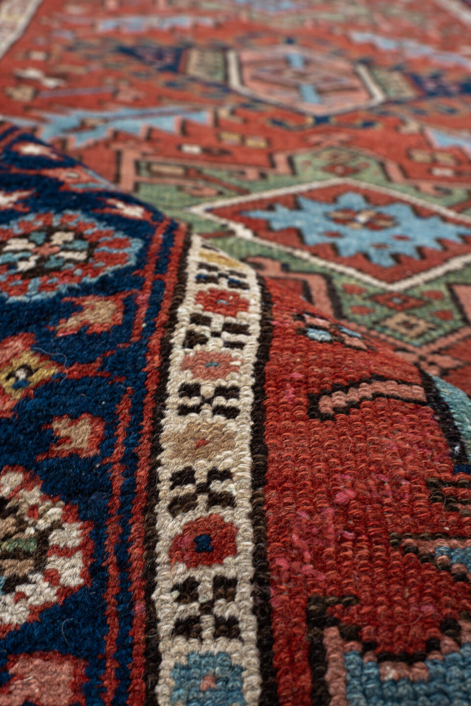 3' x 12' one-of-a-kind handmade antique Karaje runner rug. Color palette: rust, navy, ivory, sky_blue, sage, camel