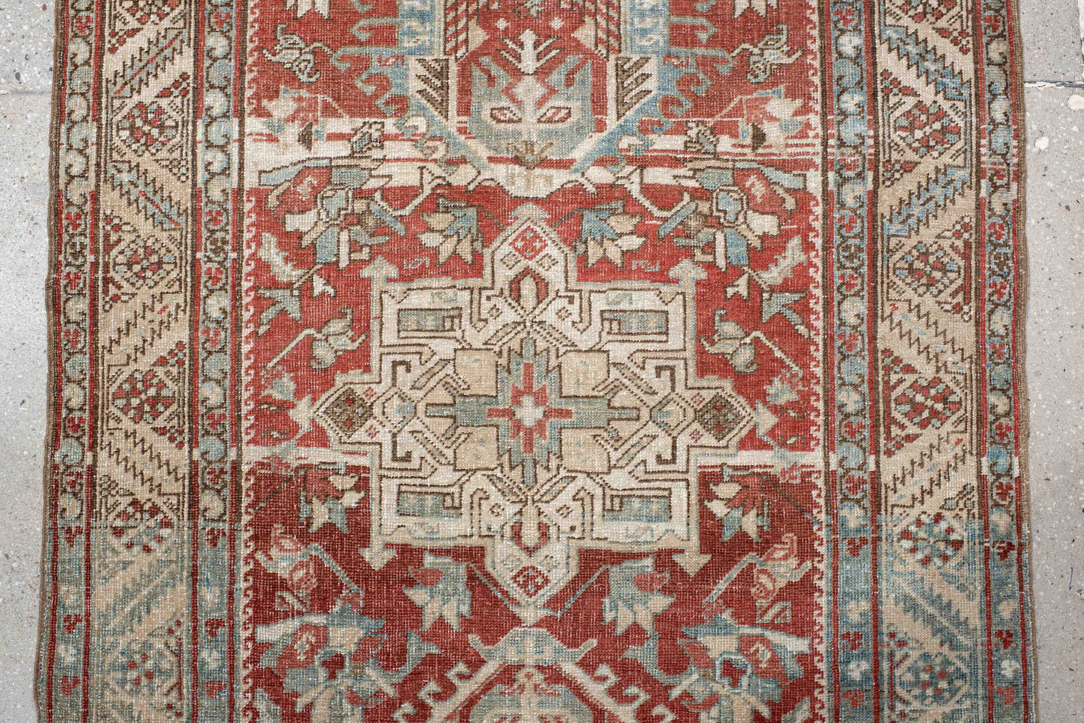 0' x 0' one-of-a-kind handmade vintage Heriz small size rug. Color palette: rust, ivory, pale blue, brick, cream, taupe