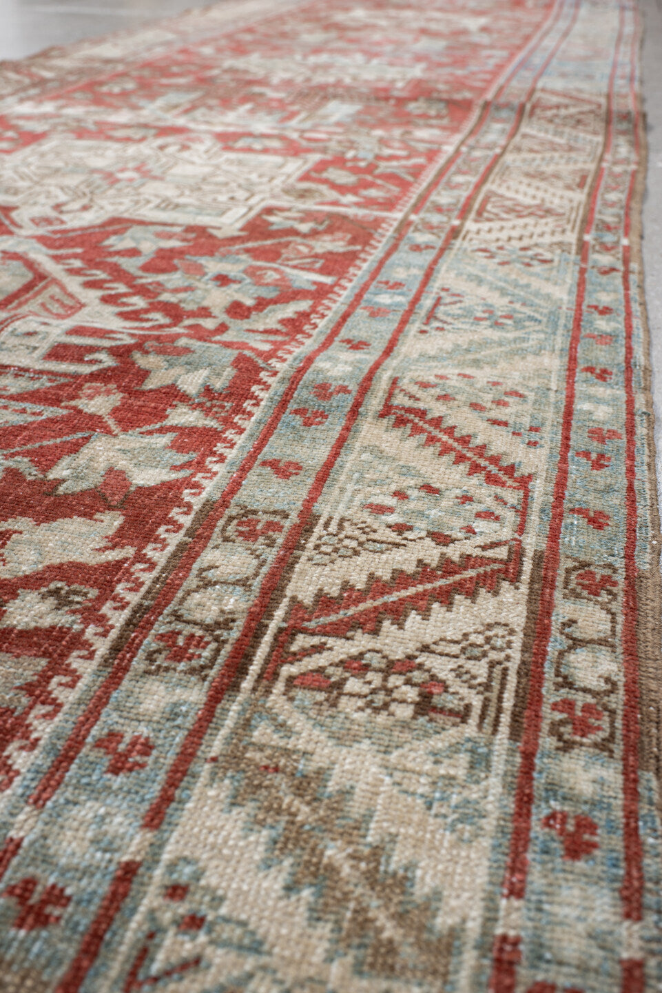 0' x 0' one-of-a-kind handmade vintage Heriz small size rug. Color palette: rust, ivory, pale blue, brick, cream, taupe