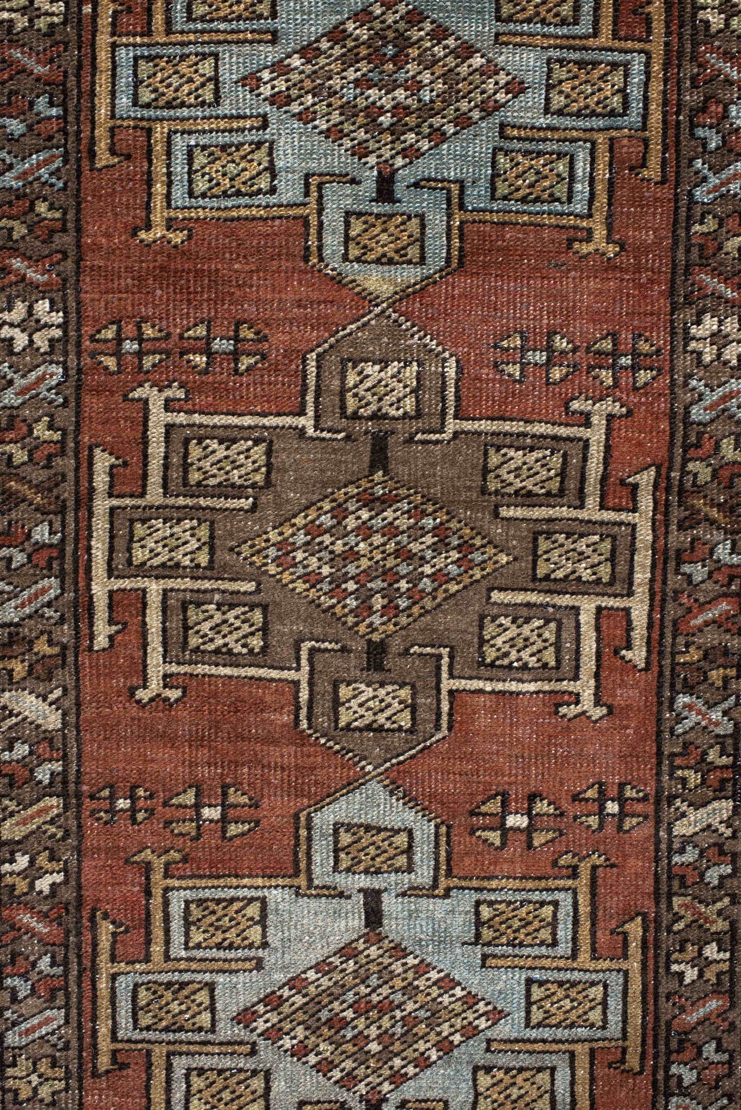 3' x 12' one-of-a-kind handmade antique Heriz runner rug. Color palette: rust, brown, ivory, sky blue, taupe, charcoal