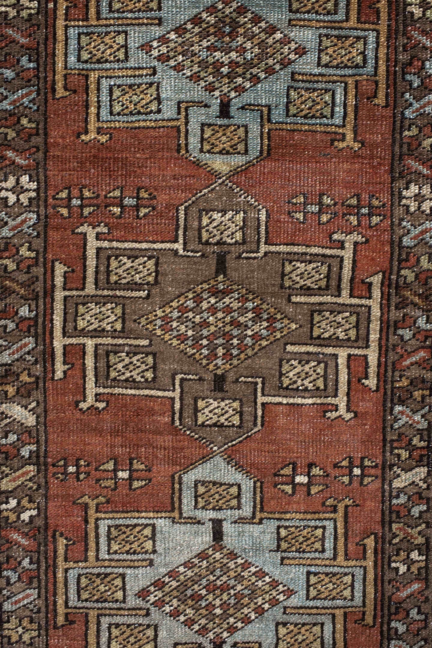 3' x 12' one-of-a-kind handmade antique Heriz runner rug. Color palette: rust, brown, ivory, sky blue, taupe, charcoal