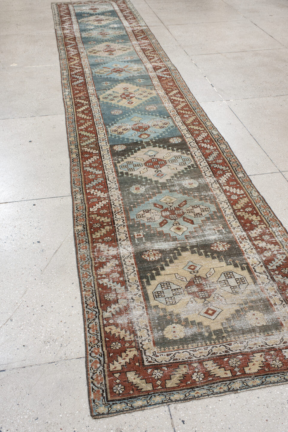 3' x 17' one-of-a-kind handmade antique NW Persian runner rug. Color palette: ivory, sky blue, rust, slate, taupe, charcoal