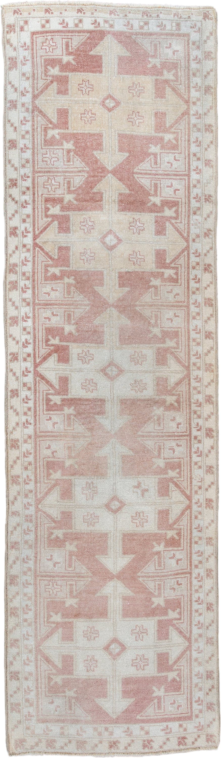 3' x 6' one-of-a-kind handmade antique  runner rug. Color palette: ivory, blush, rust, cream, sand, pink, terracotta, brown