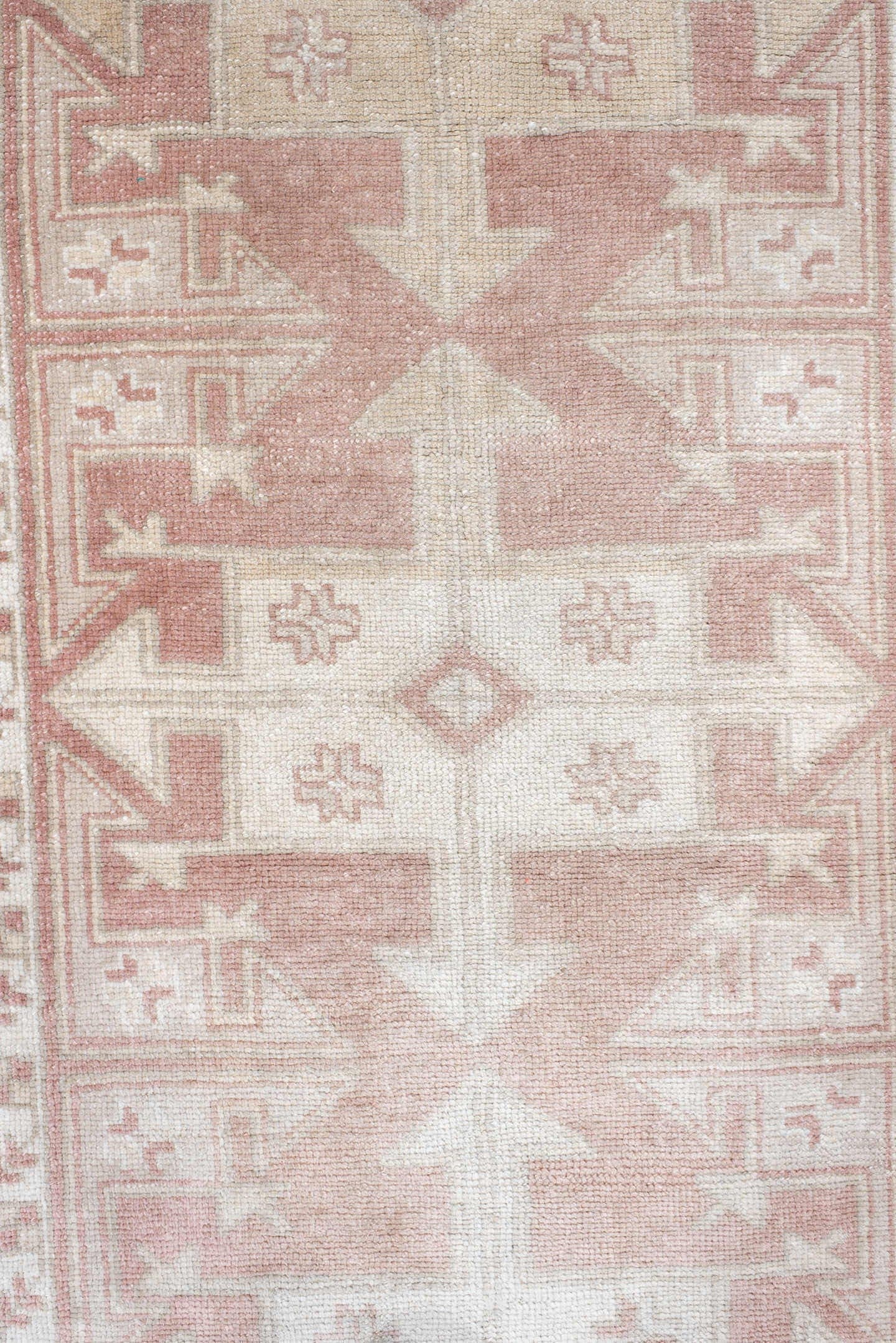 3' x 6' one-of-a-kind handmade antique  runner rug. Color palette: ivory, blush, rust, cream, sand, pink, terracotta, brown