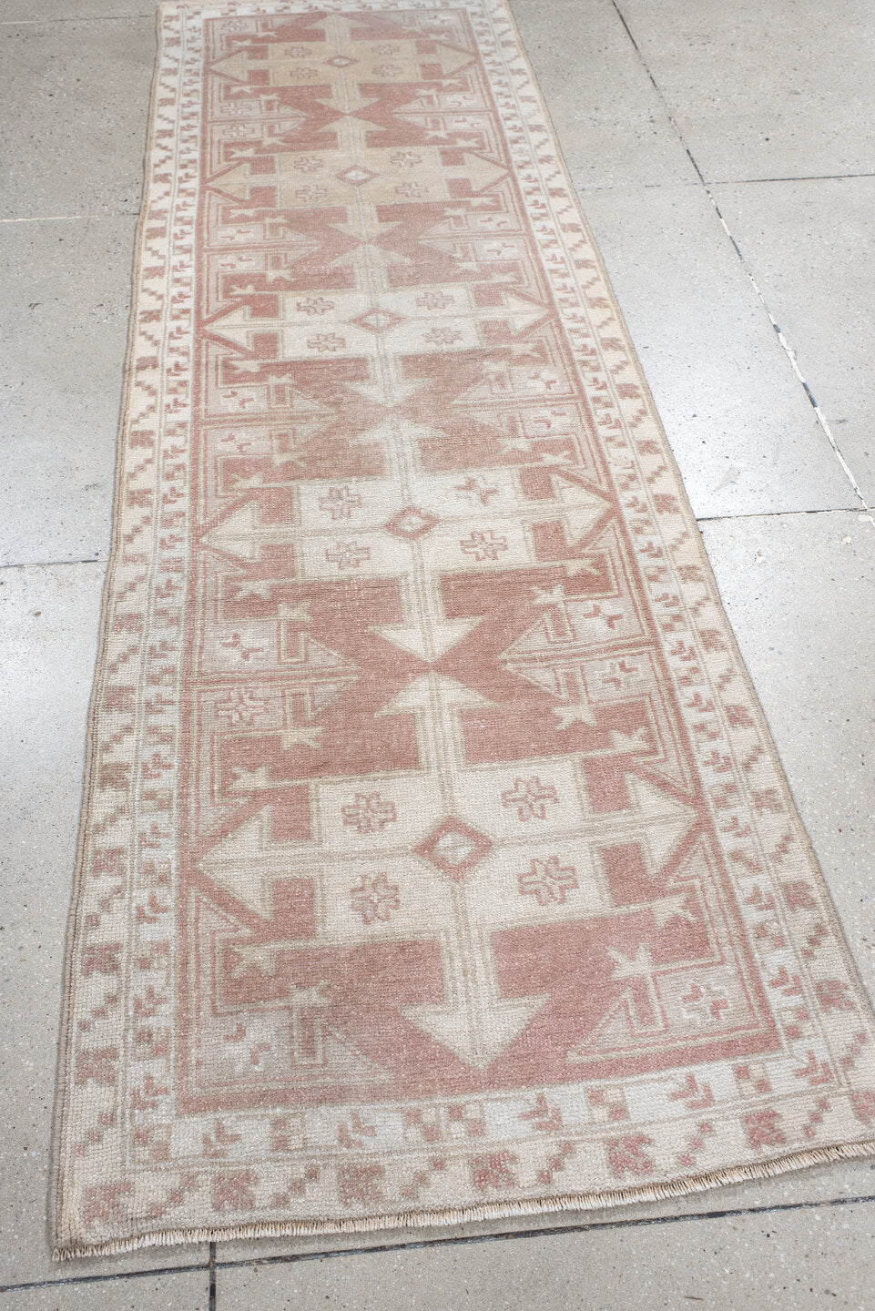 3' x 6' one-of-a-kind handmade vintage  runner rug. Color palette: gainsboro, gray, light gray, off-white, pink, rosy brown
