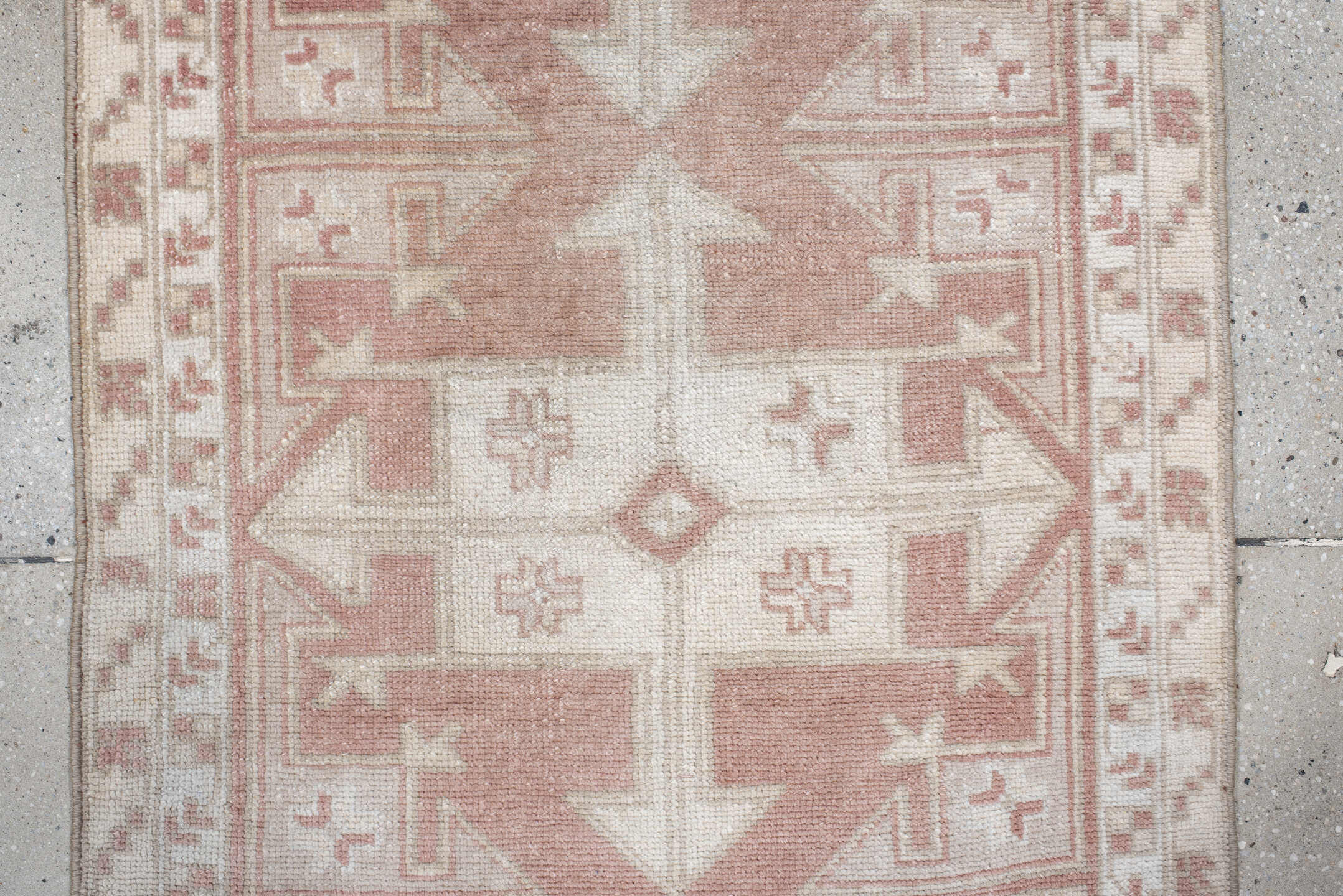 3' x 6' one-of-a-kind handmade antique  runner rug. Color palette: ivory, blush, rust, cream, sand, pink, terracotta, brown