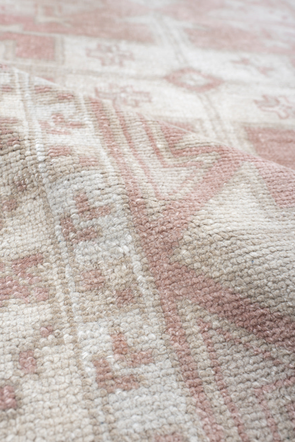 3' x 6' one-of-a-kind handmade vintage  runner rug. Color palette: gainsboro, gray, light gray, off-white, pink, rosy brown