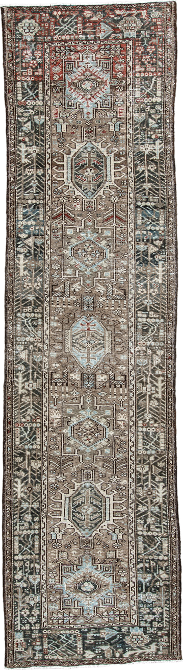 2' x 10' one-of-a-kind handmade vintage Karaje runner rug. Color palette: taupe, charcoal, ivory, pale blue, rust, brown