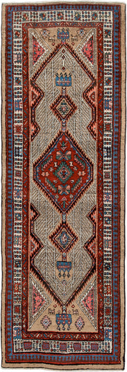 2' x 8' one-of-a-kind handmade antique Sarab runner rug. Color palette: ivory, rust, indigo, camel, rose, charcoal, sky_blue