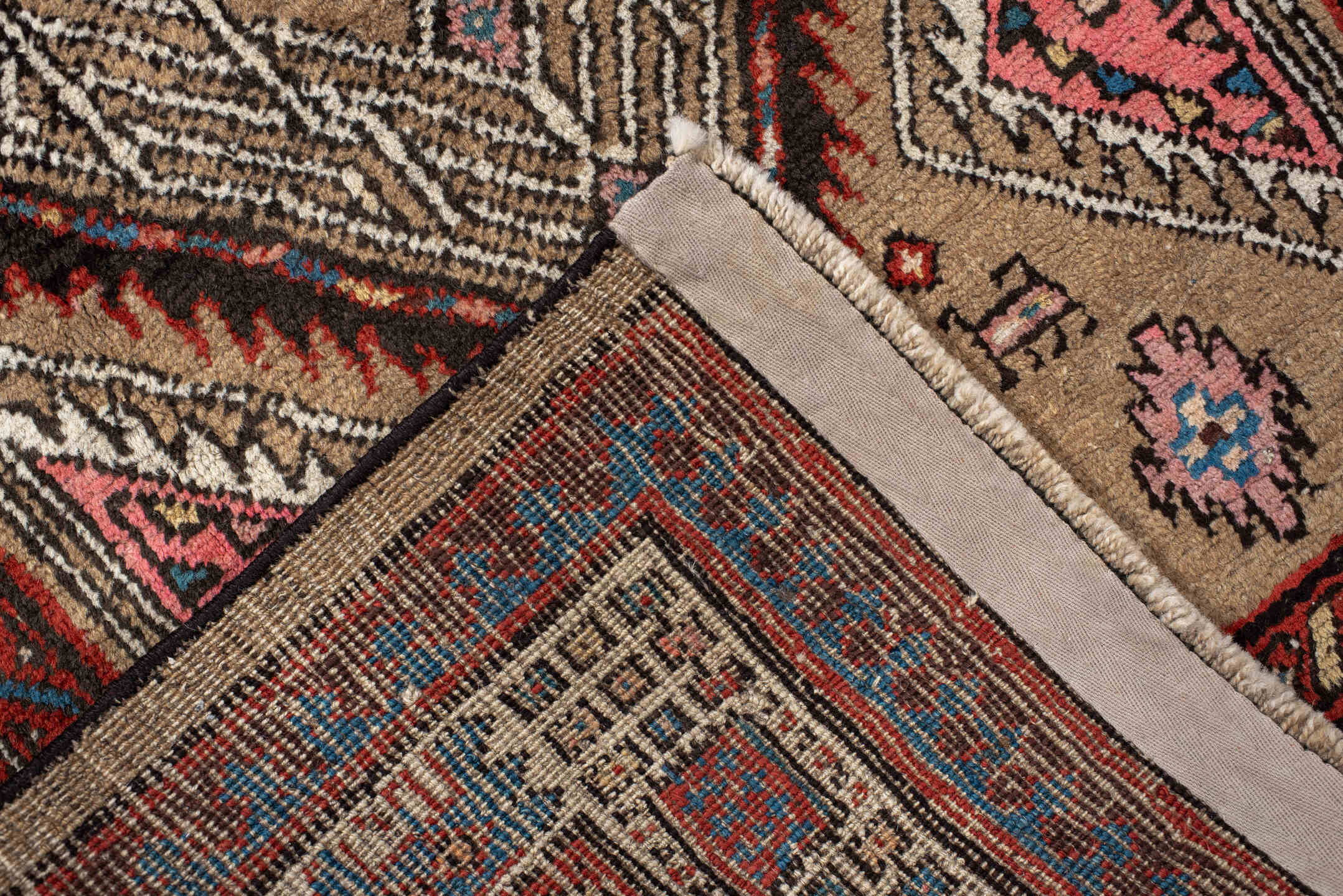 2' x 8' one-of-a-kind handmade antique Sarab runner rug. Color palette: ivory, rust, indigo, camel, rose, charcoal, sky_blue