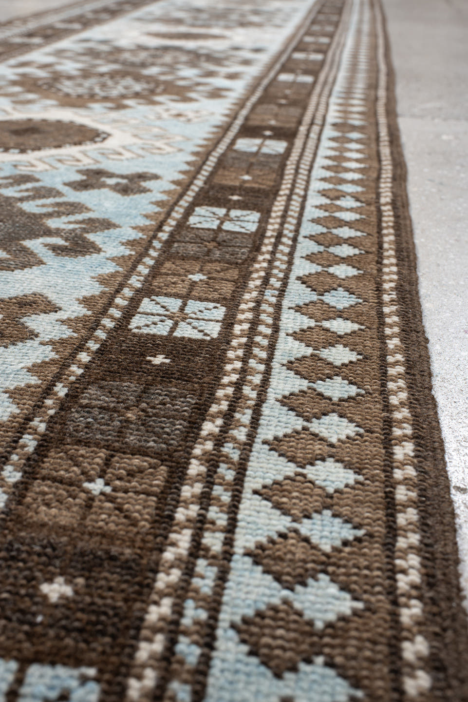 2' x 9' one-of-a-kind handmade vintage Anatolian runner rug. Color palette: brown, ivory, light blue, taupe, charcoal, beige