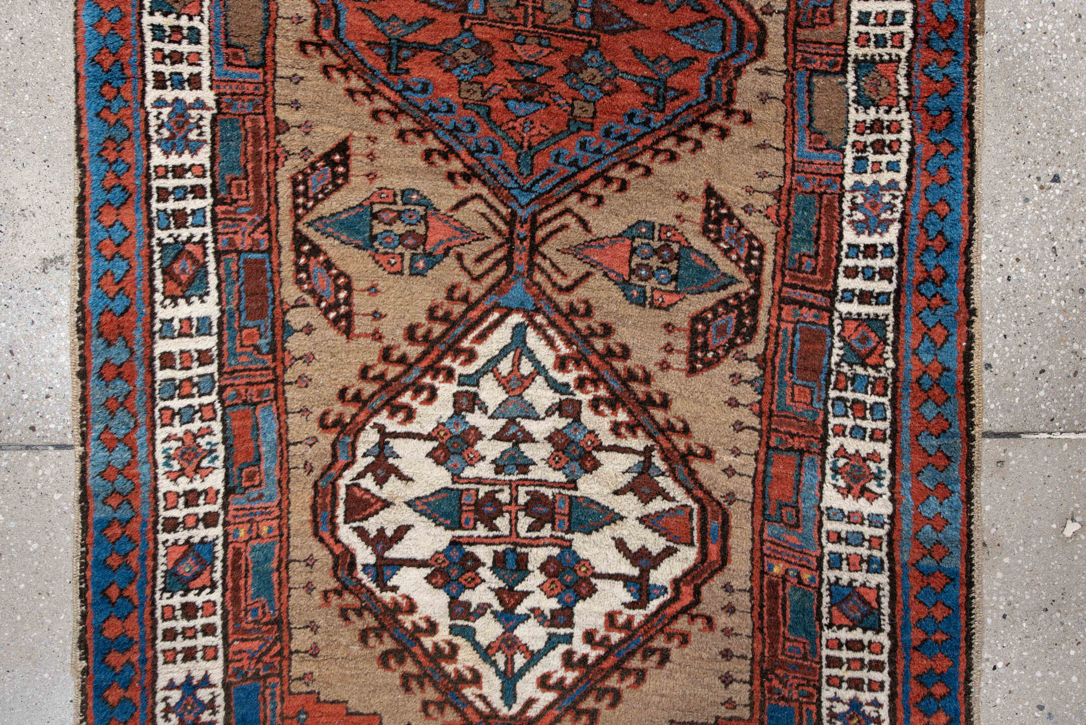 2' x 6' one-of-a-kind handmade antique Sarab runner rug. Color palette: ivory, sky blue, rust, navy, terracotta, brown
