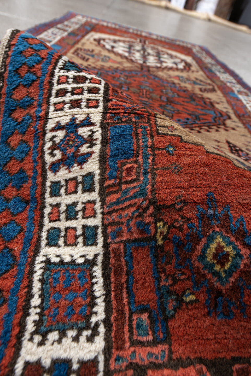 2' x 6' one-of-a-kind handmade antique Sarab runner rug. Color palette: ivory, sky blue, rust, navy, terracotta, brown