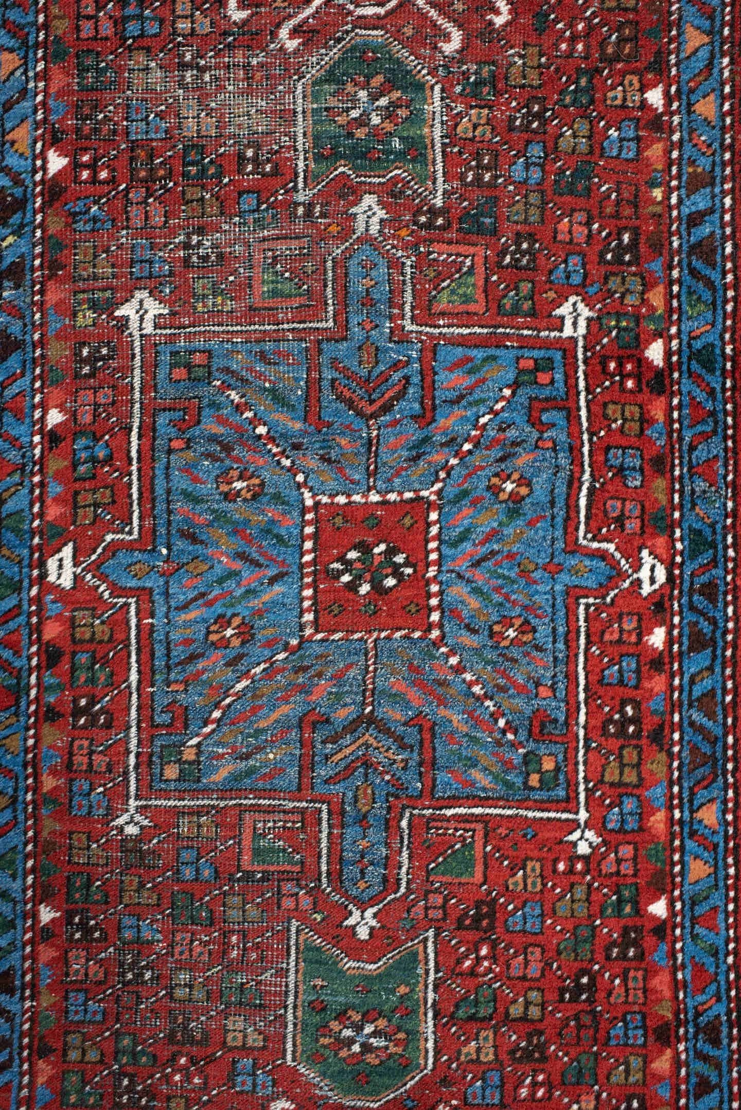2' x 10' one-of-a-kind handmade antique Karaje runner rug. Color palette: rust, sky blue, ivory, teal, crimson, charcoal
