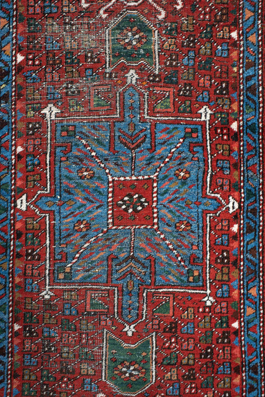 2' x 10' one-of-a-kind handmade antique Karaje runner rug. Color palette: rust, sky blue, ivory, teal, crimson, charcoal
