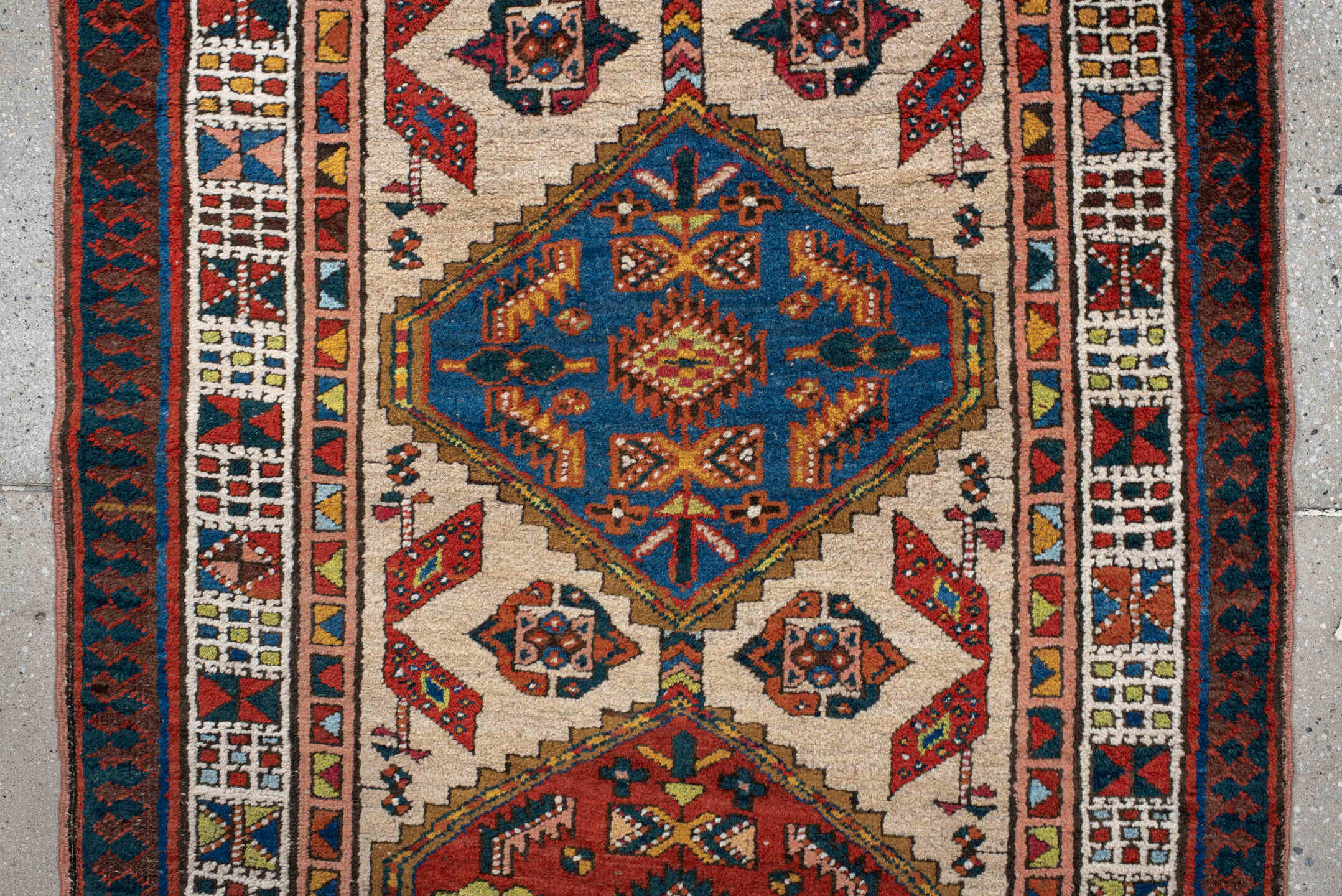 3' x 7' one-of-a-kind handmade antique Sarab runner rug. Color palette: ivory, indigo, rust, camel, navy, coral, gold, sage