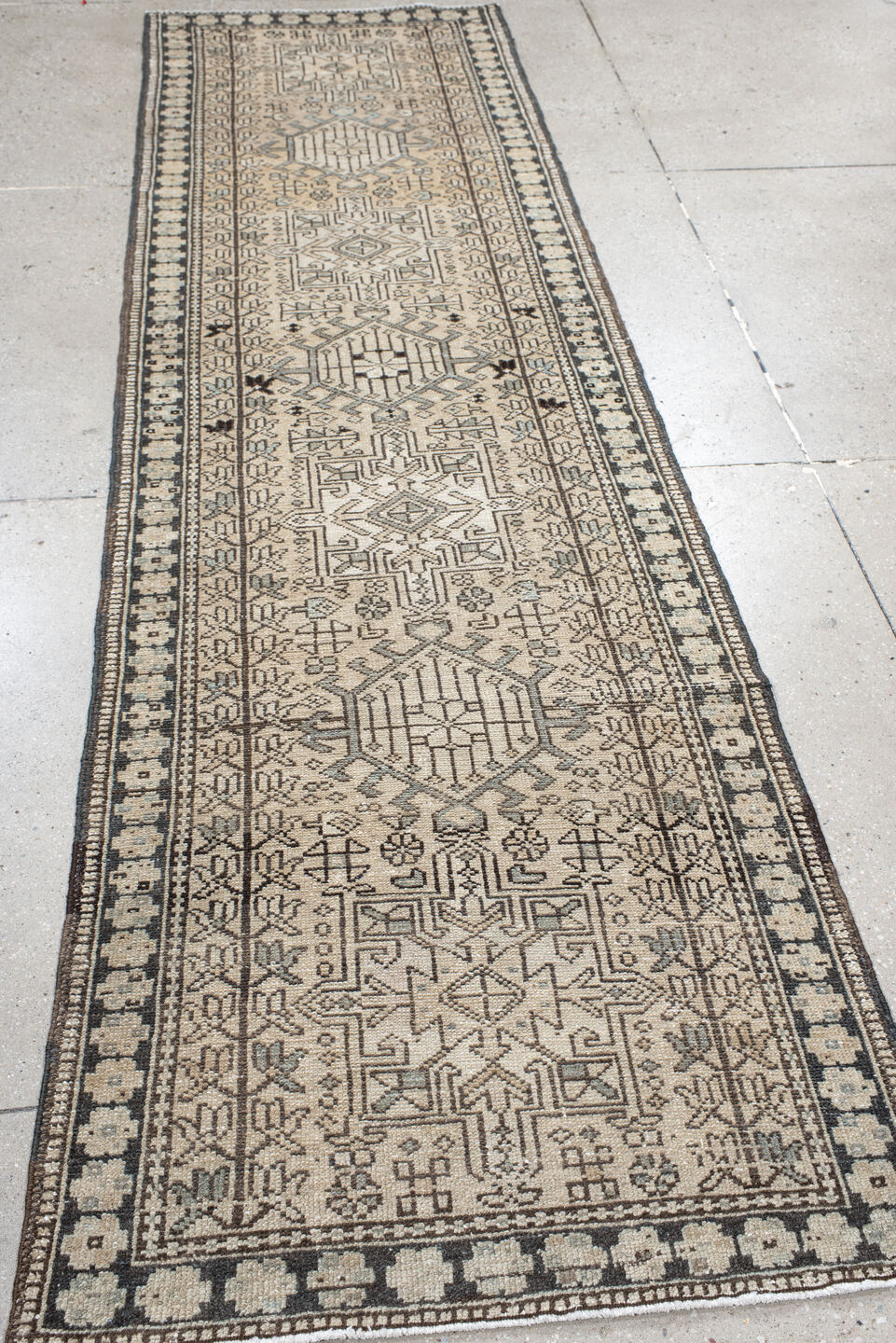 2' x 9' one-of-a-kind handmade vintage Karaje runner rug. Color palette: antiquewhite, black, brown, dark gray, gray