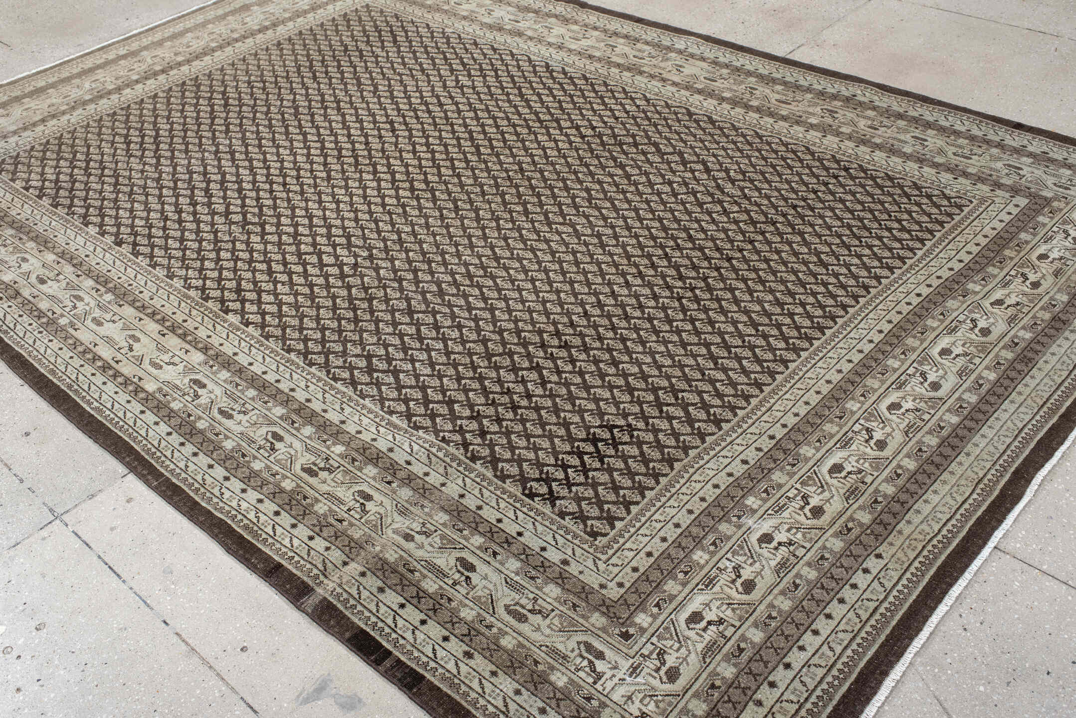 7' x 10' one-of-a-kind handmade vintage Mir large size rug. Color palette: black, brown, gray, light gray, off-white, pink
