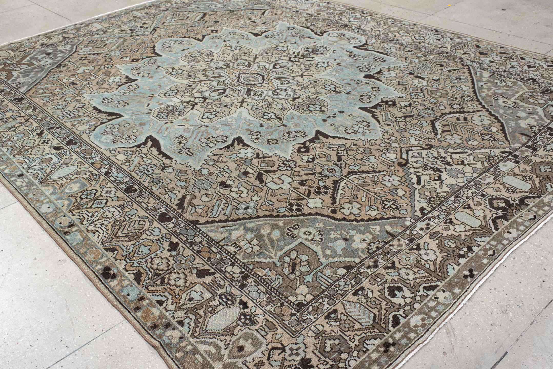 9' x 12' one-of-a-kind handmade antique Baktiary large size rug. Color palette: taupe, pale blue, ivory, charcoal, beige