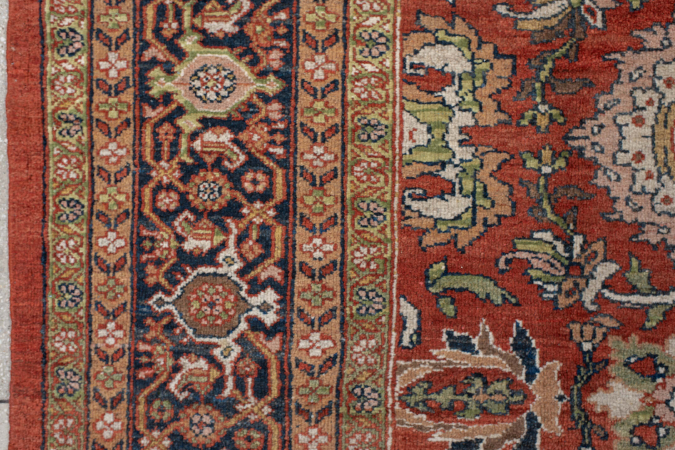 10' x 17' one-of-a-kind handmade antique Mahal rug. Color palette: terra cotta, navy, ivory, sage, gold, rust, olive, camel