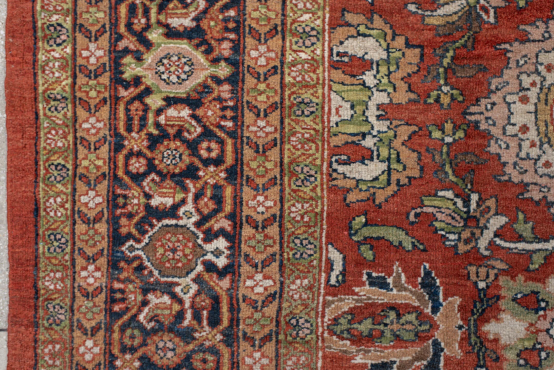 10' x 17' one-of-a-kind handmade antique Mahal rug. Color palette: terra cotta, navy, ivory, sage, gold, rust, olive, camel