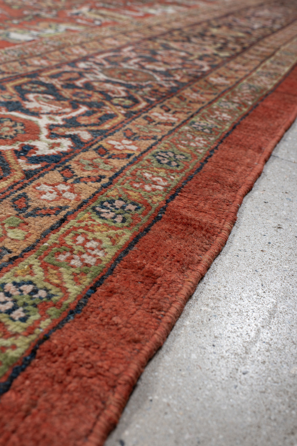 10' x 17' one-of-a-kind handmade antique Mahal rug. Color palette: terra cotta, navy, ivory, sage, gold, rust, olive, camel