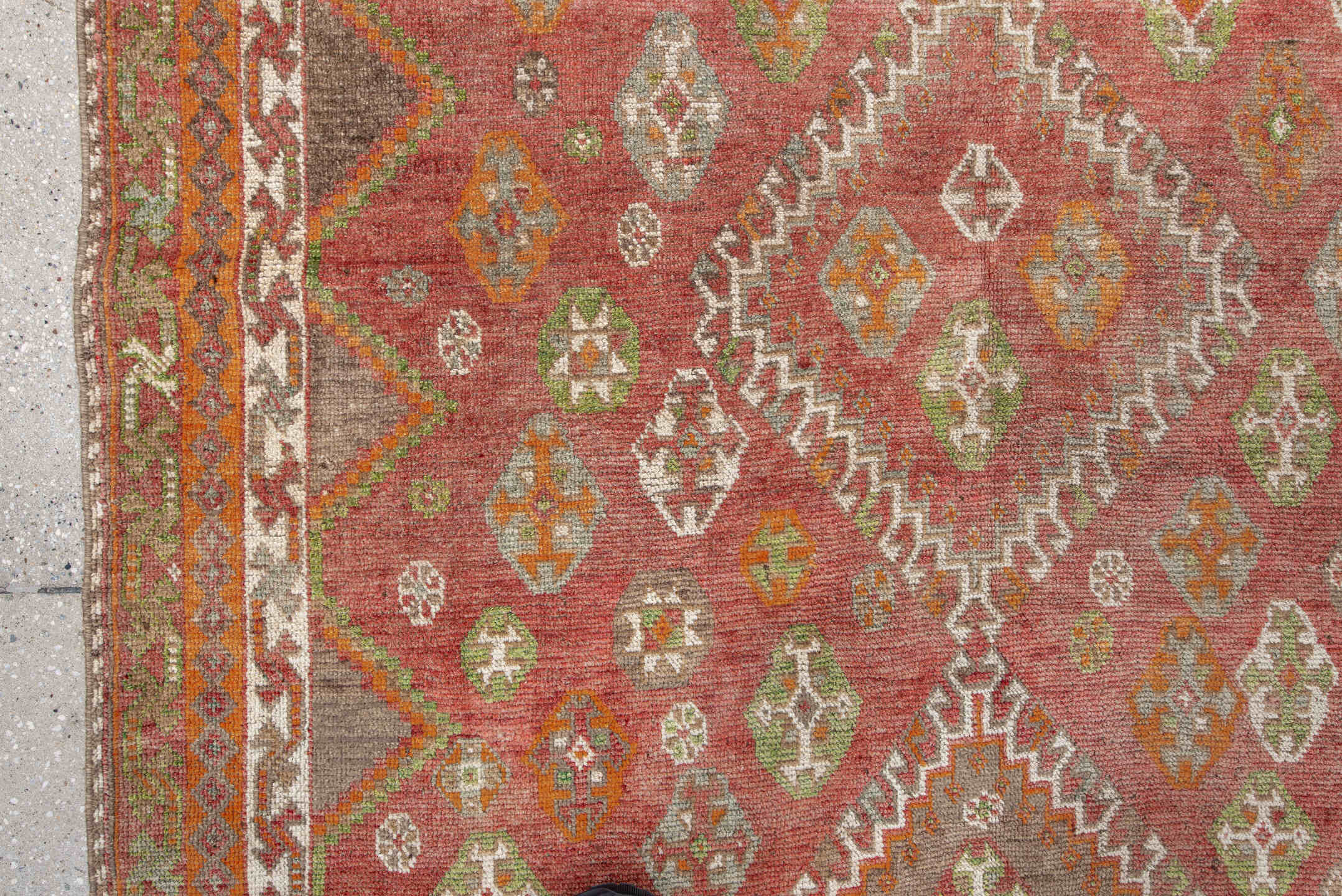 4' x 7' one-of-a-kind handmade vintage Gabbe rug. Color palette: brown, gray, light gray, off-white, orange, pink