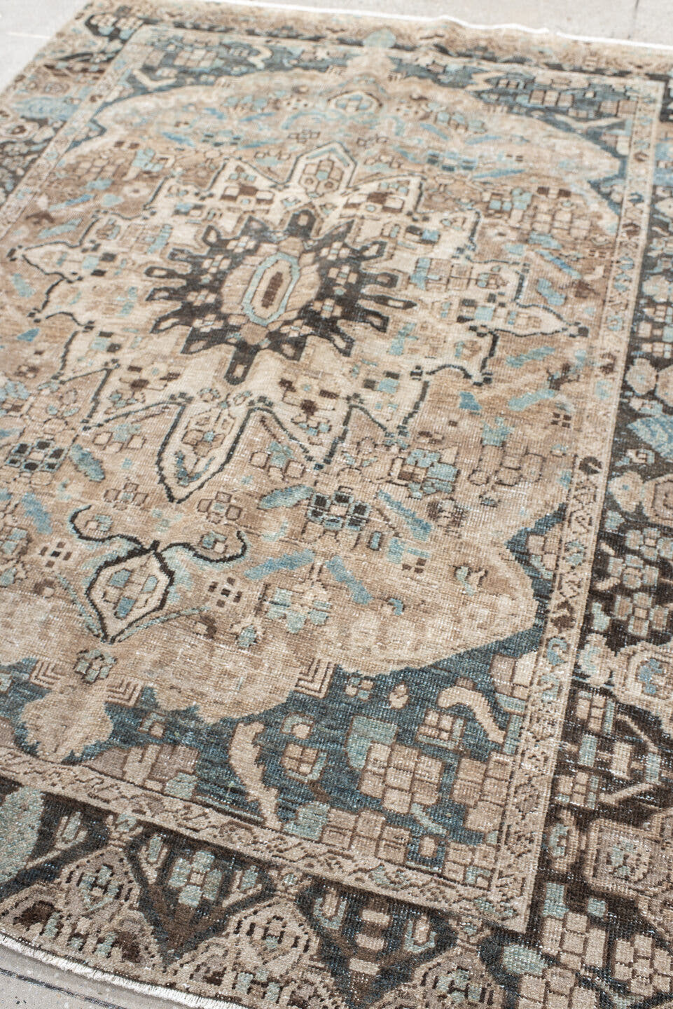5' x 7' one-of-a-kind handmade vintage Baktiary rug. Color palette: ivory, taupe, aqua, brown, charcoal, cream, beige, gray