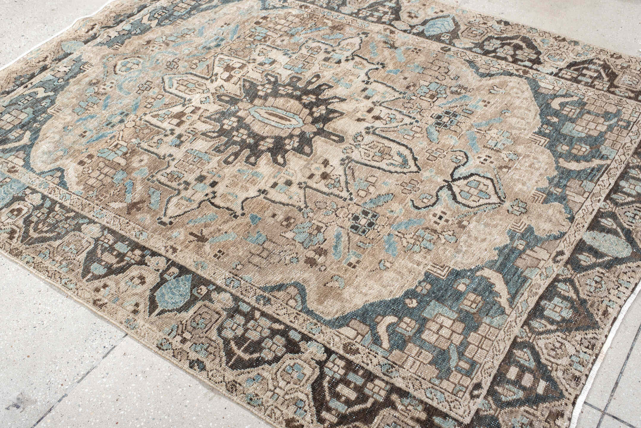 5' x 7' one-of-a-kind handmade vintage Baktiary rug. Color palette: ivory, taupe, aqua, brown, charcoal, cream, beige, gray