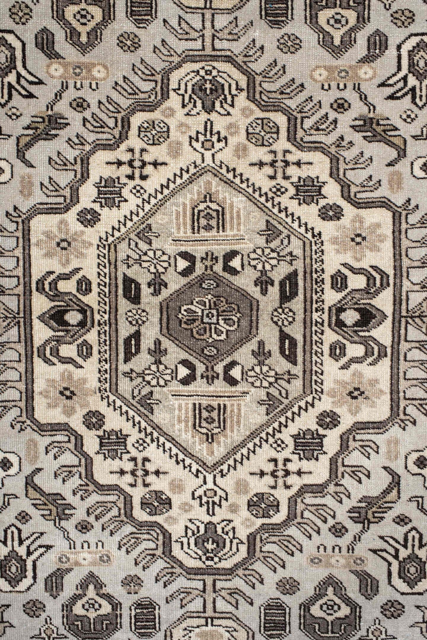5' x 8' one-of-a-kind handmade antique  medium size rug. Color palette: ivory, taupe, brown, charcoal, beige, gray, black