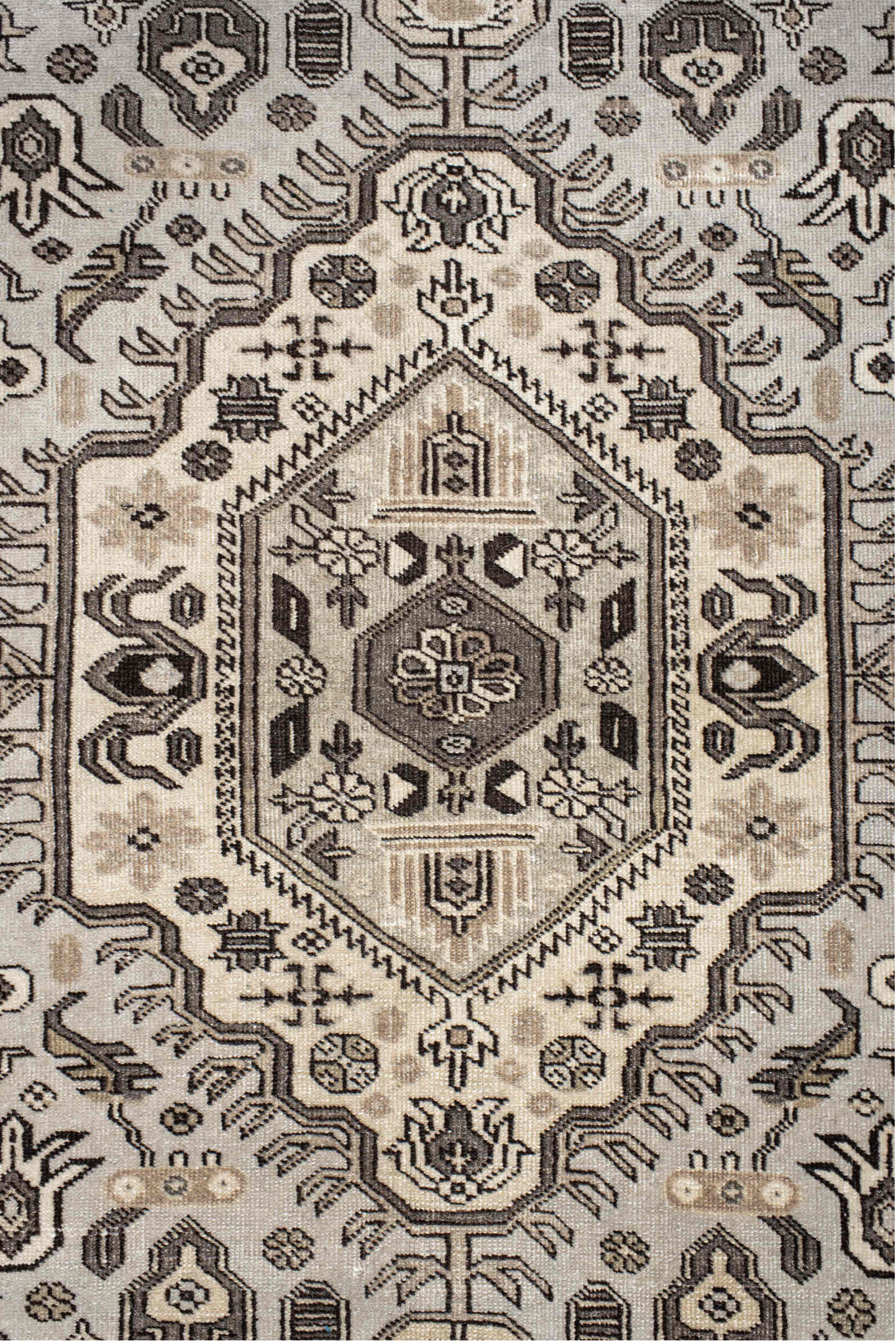 5' x 8' one-of-a-kind handmade vintage  medium size rug. Color palette: antiquewhite, black, gray, light gray, misty rose