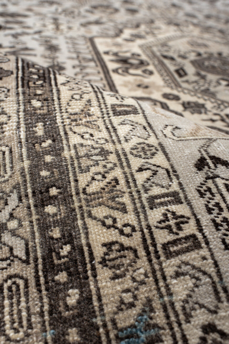 5' x 8' one-of-a-kind handmade antique  medium size rug. Color palette: ivory, taupe, brown, charcoal, beige, gray, black