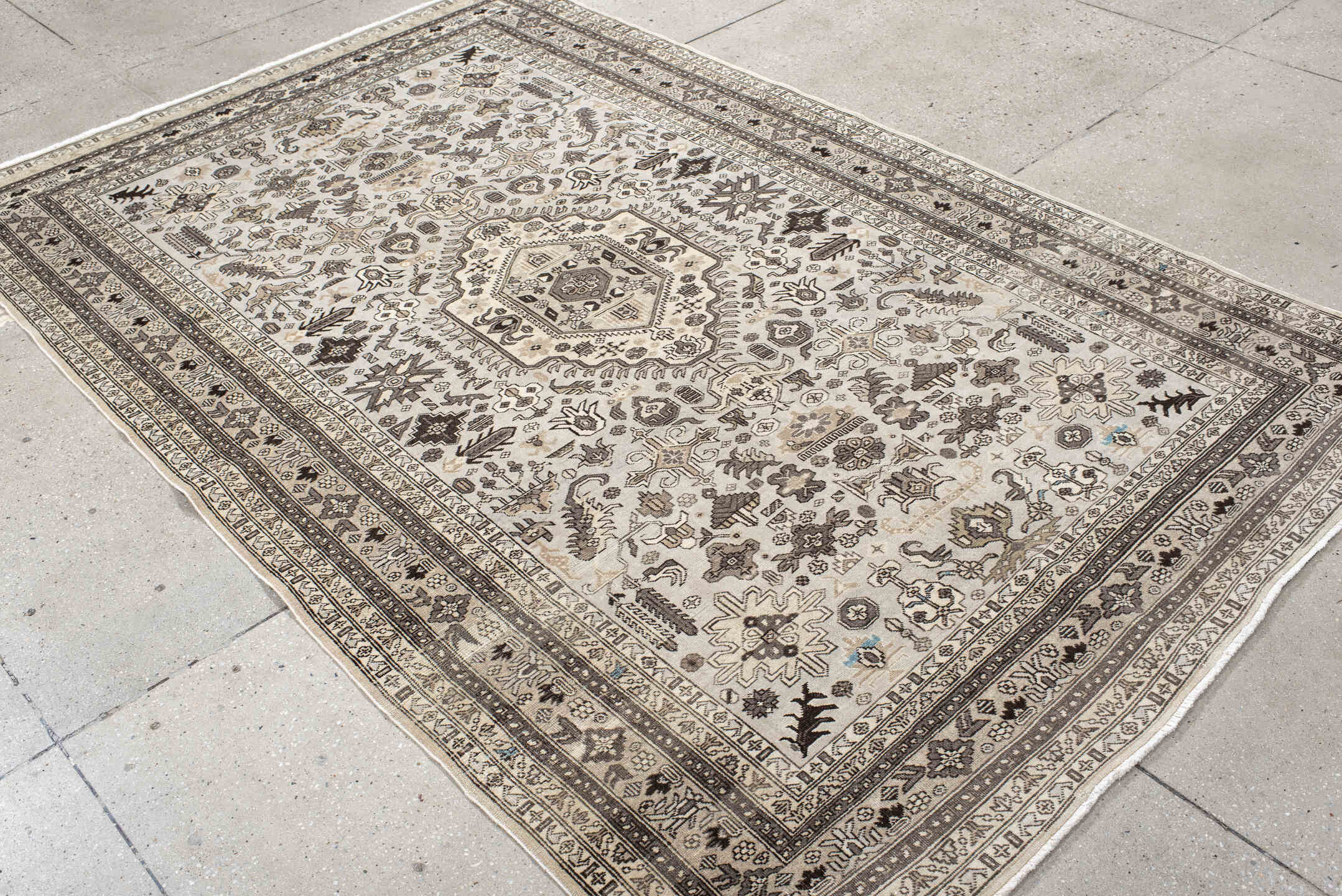 5' x 8' one-of-a-kind handmade vintage  medium size rug. Color palette: antiquewhite, black, gray, light gray, misty rose