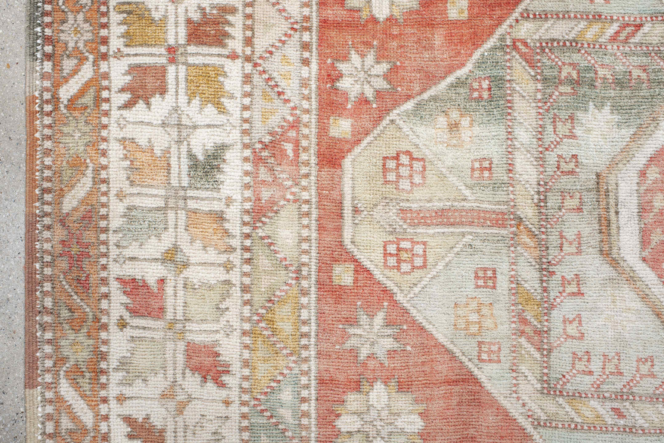 6' x 9' one-of-a-kind handmade antique Anatolian medium size rug. Color palette: ivory, coral, sage, pale_blue, taupe, gold