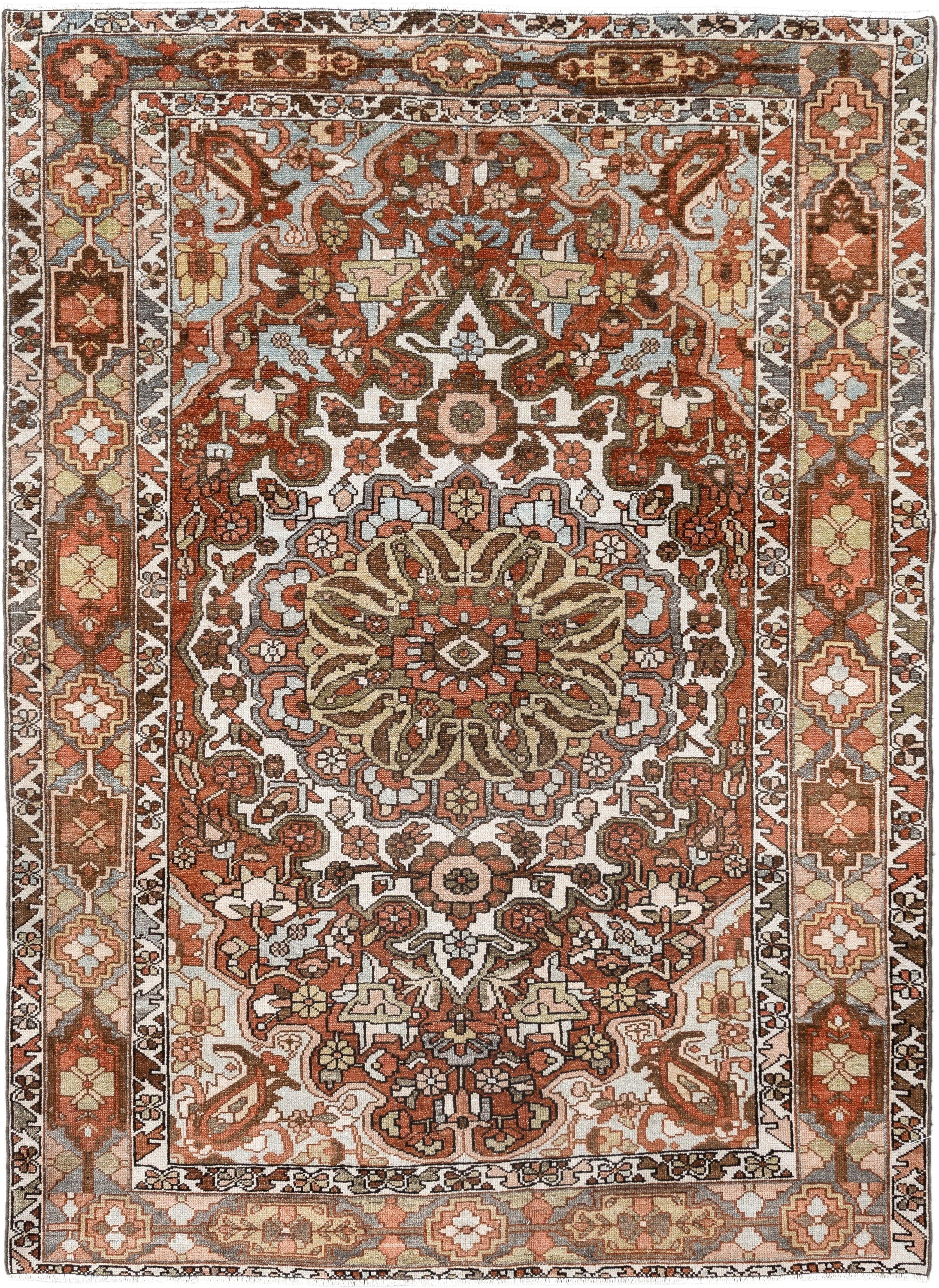 4' x 6' one-of-a-kind handmade vintage Baktiary small size rug. Color palette: ivory, rust, brown, sky blue, taupe, camel