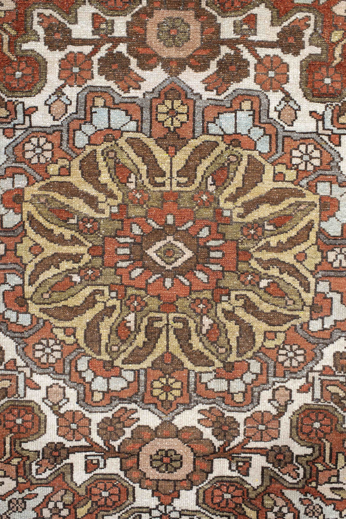 4' x 6' one-of-a-kind handmade vintage Baktiary small size rug. Color palette: ivory, rust, brown, sky blue, taupe, camel
