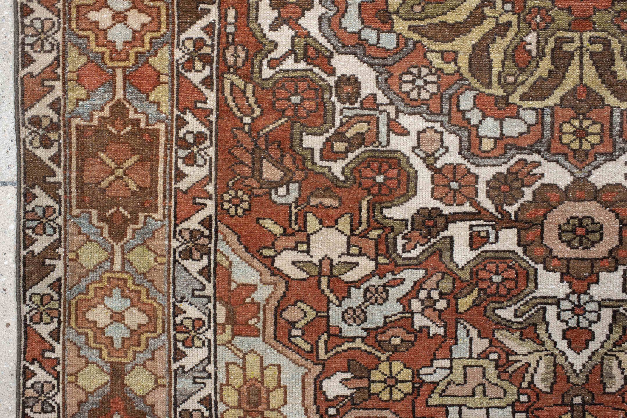 4' x 6' one-of-a-kind handmade vintage Baktiary small size rug. Color palette: ivory, rust, brown, sky blue, taupe, camel