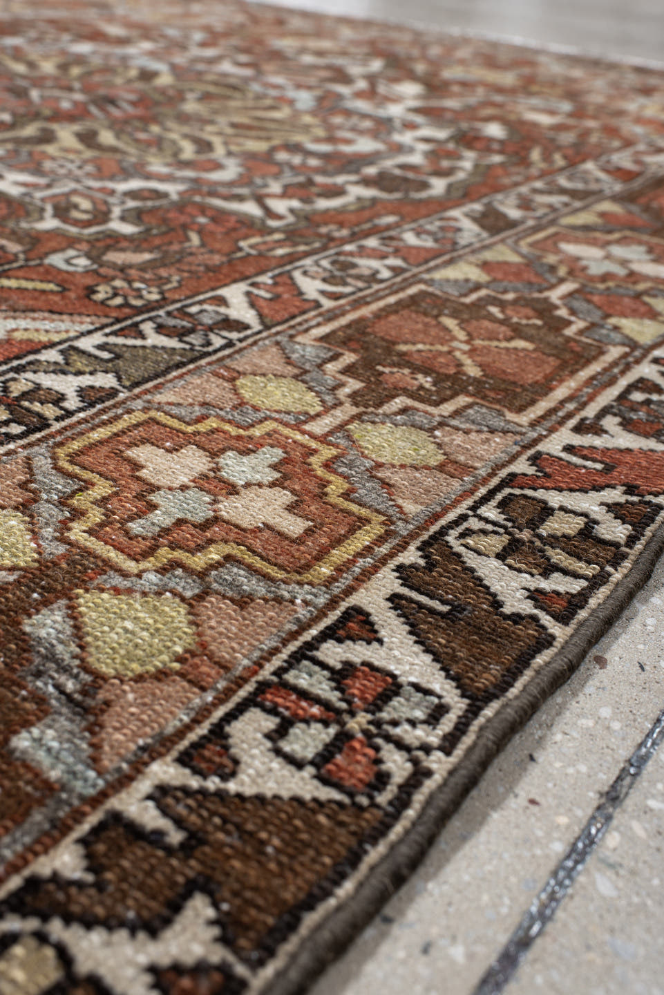 4' x 6' one-of-a-kind handmade vintage Baktiary small size rug. Color palette: ivory, rust, brown, sky blue, taupe, camel