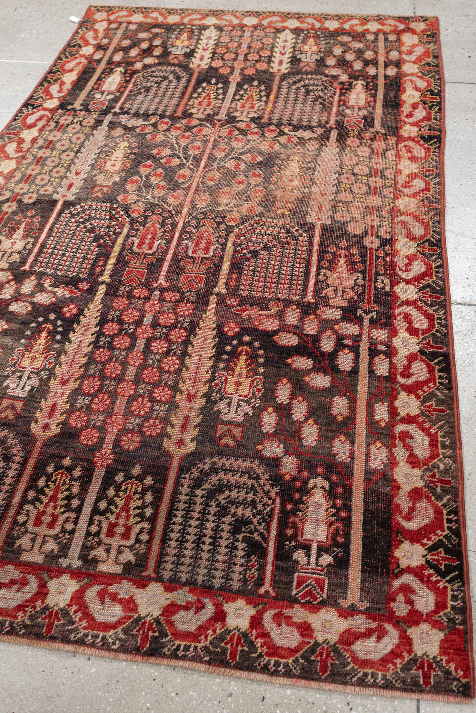 4' x 7' one-of-a-kind handmade vintage Anatolian rug. Color palette: charcoal, rust, ivory, rose, taupe, mahogany, black