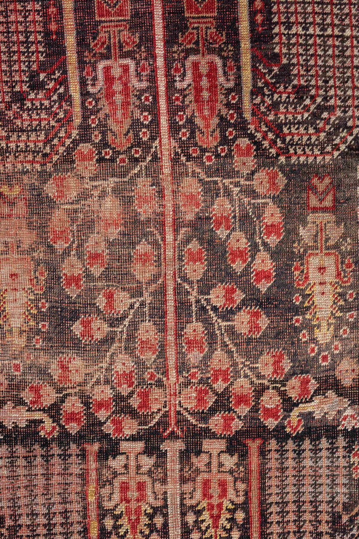 4' x 7' one-of-a-kind handmade vintage Anatolian rug. Color palette: charcoal, rust, ivory, rose, taupe, mahogany, black